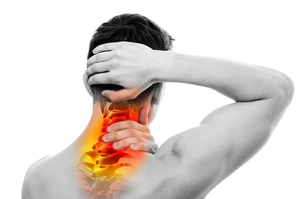 An image of a man holding the back of his neck and pain illustrated in red, orange and yellow